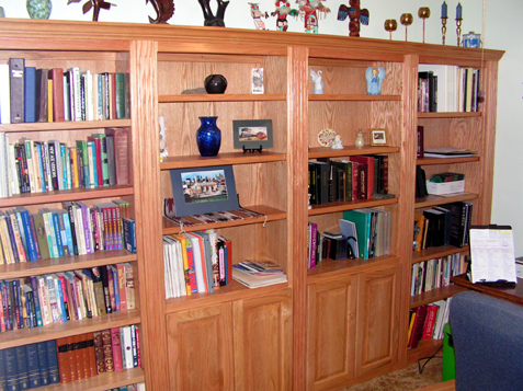 Custom Built-in Bookcase with Fluted Trim, Raised Panel Doors and Crown Molding  Kansas City